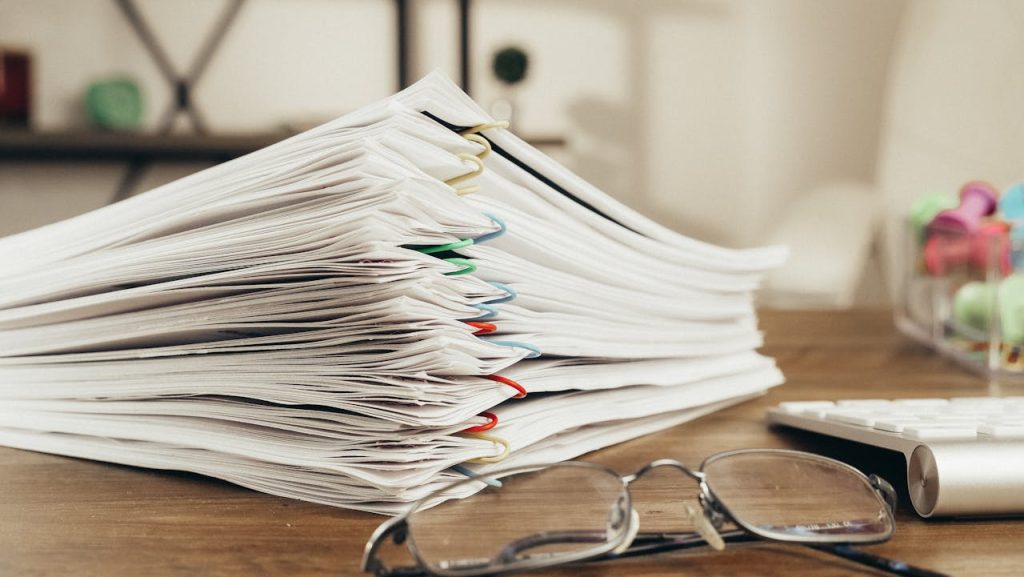 stack of documents on a desk